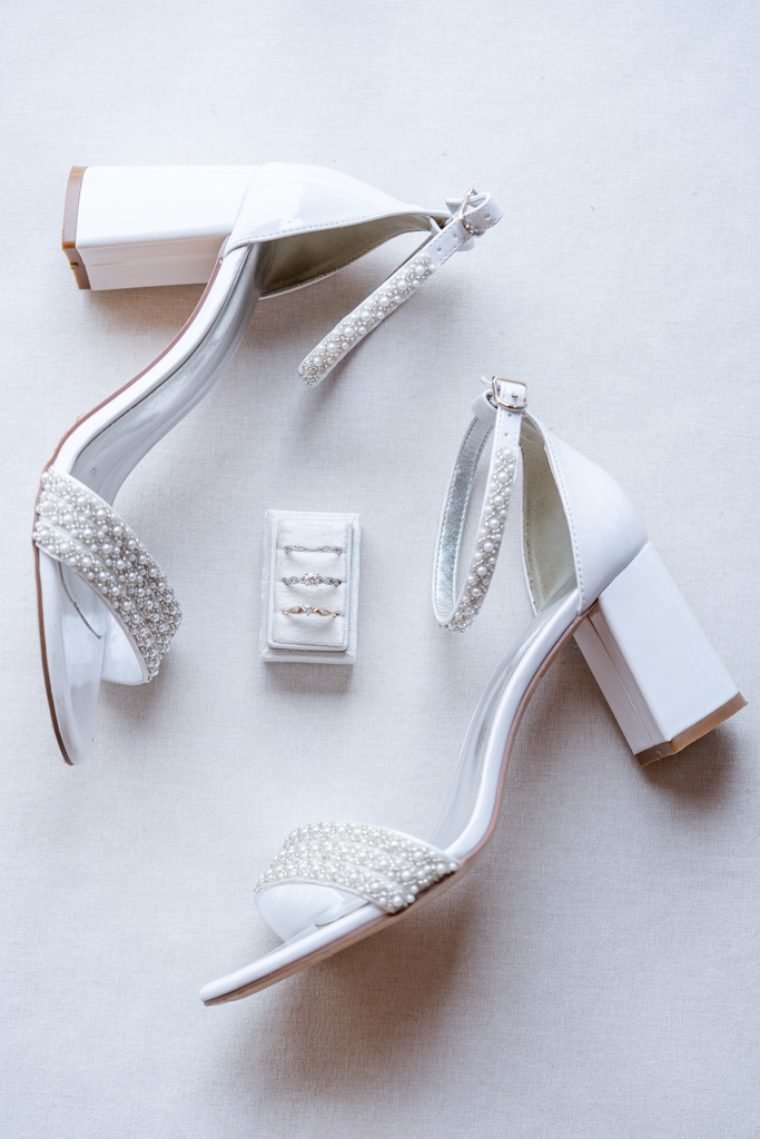 Bride shoe and ring detail photo