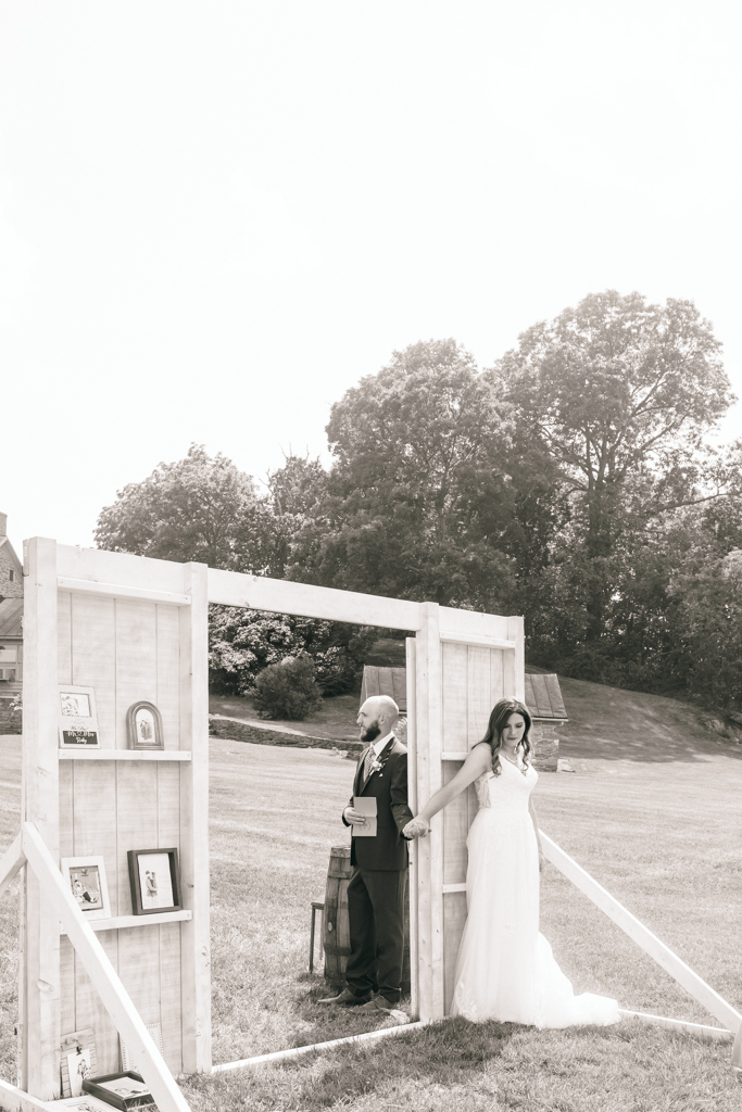 Bride and groom first touch at Foggy Bottom Farm in Hampstead, Maryland