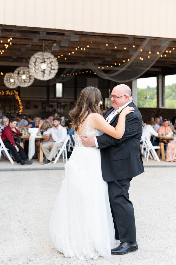 Father and daughter dance at Foggy Bottom Farm in Hampstead, Maryland