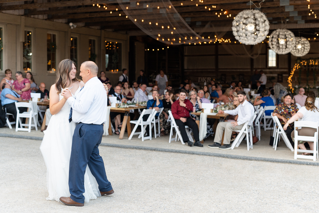 Father and daughter dance at Foggy Bottom Farm in Hampstead, Maryland