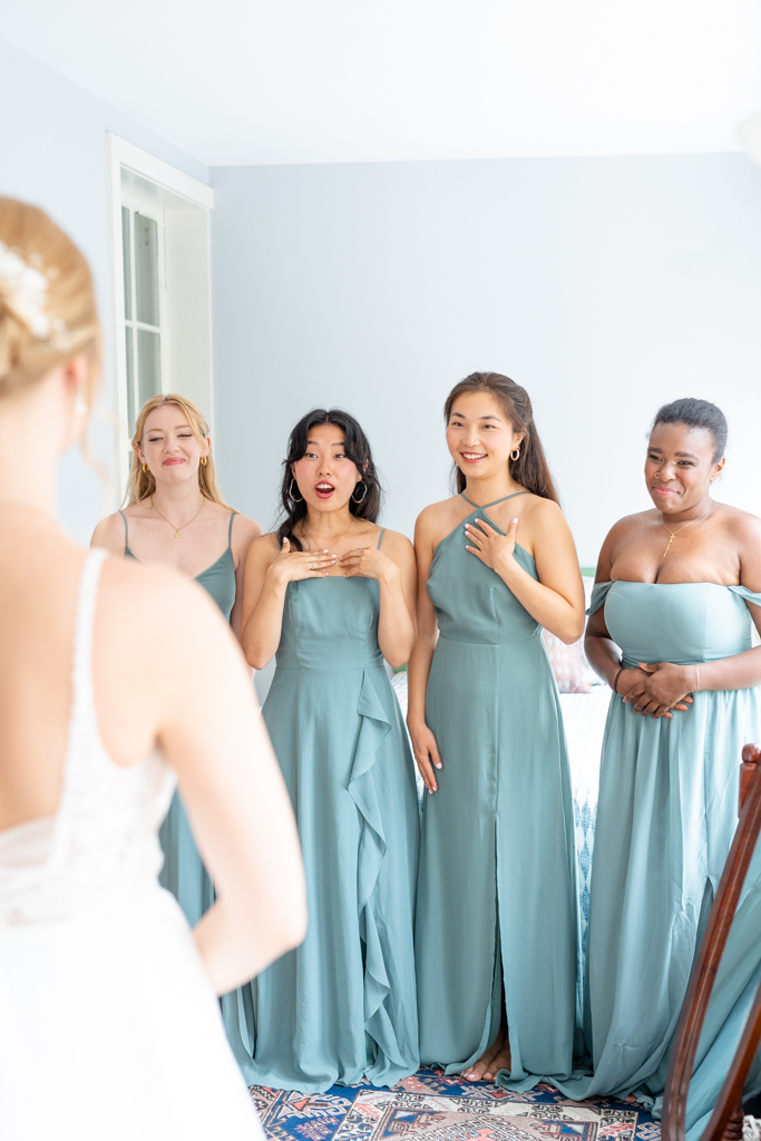 First look with bridesmaids on wedding day in Frederick, MD