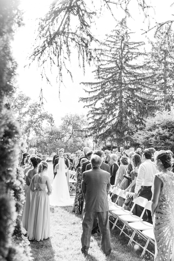 Wedding ceremony on the lawn at the Mansion at Valley Country Club in Towson, MD