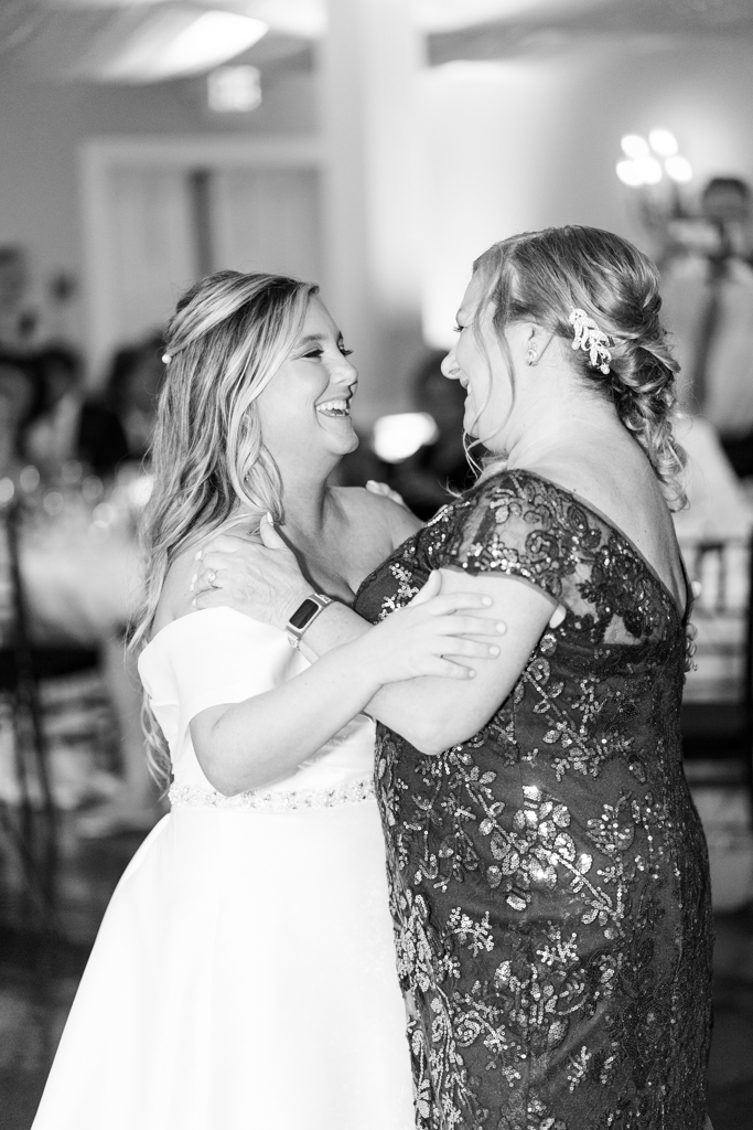 Bride and mom dance at the Mansion at Valley Country Club in Towson, MD