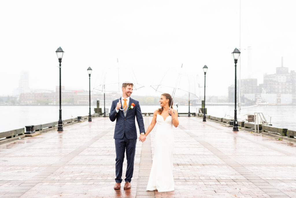 Bride and groom portrait at Baltimore Waterfront, Barcocina on a rainy wedding day