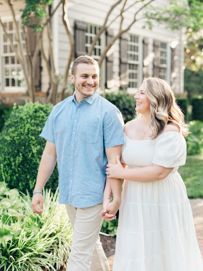 Casey and Giovanni laughing with each other at Bortner Valley during their engagement session