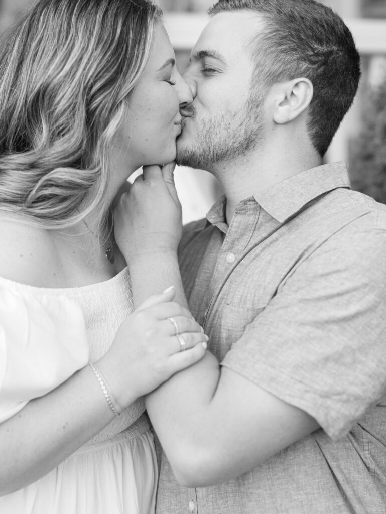 Casey and Giovanni sharing a kiss at Bortner Valley during their engagement session