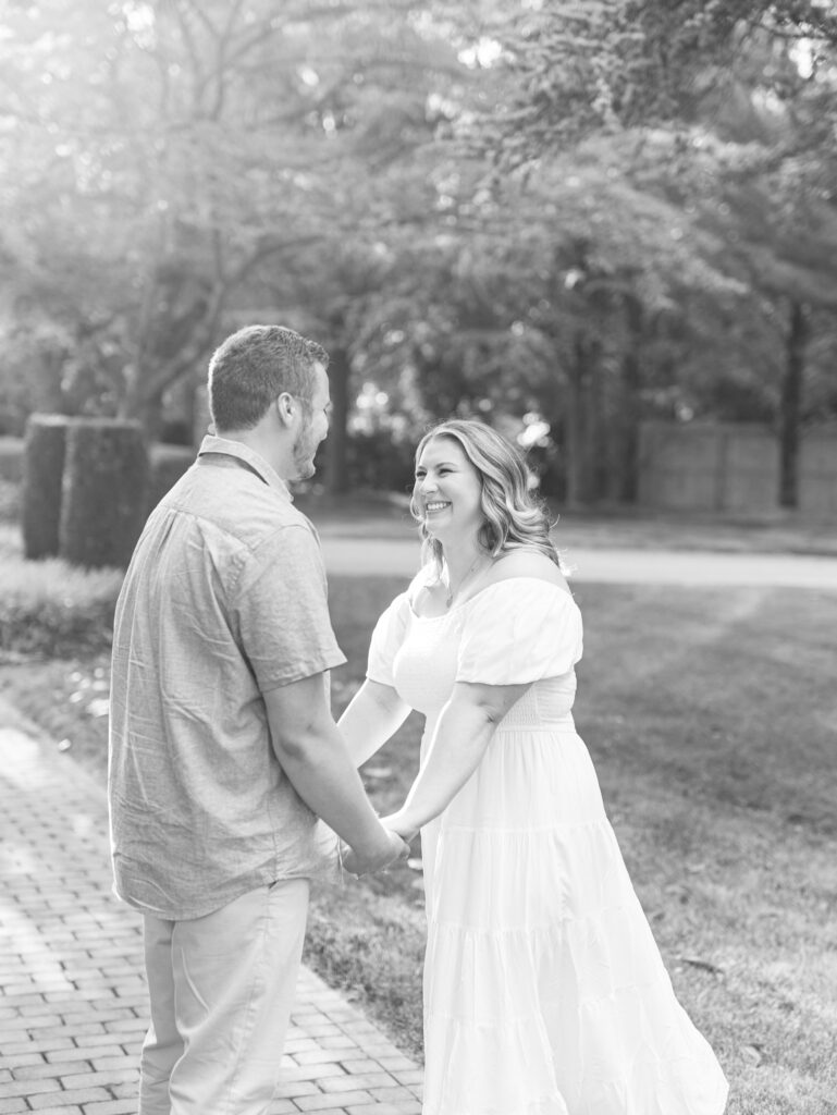 Casey and Giovanni laughing with each other at Bortner Valley during their engagement session