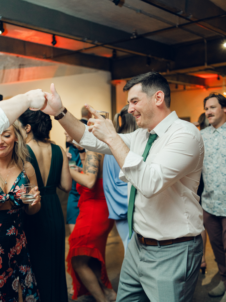 Guests dancing during Amanda and Corey's wedding day at The Bond Events.