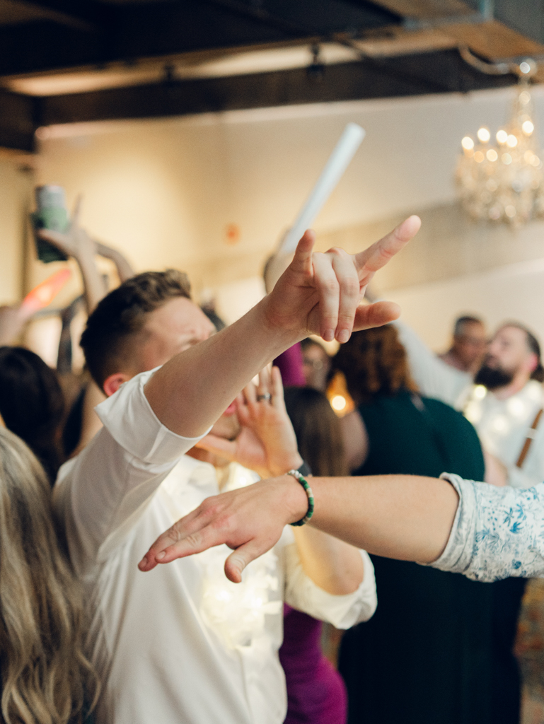 Guests dancing during Amanda and Corey's wedding day at The Bond Events.