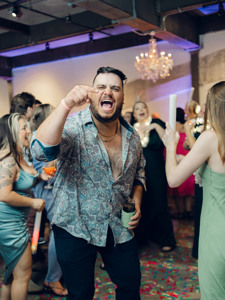 Guests dancing during Amanda and Corey's wedding day at The Bond Events.