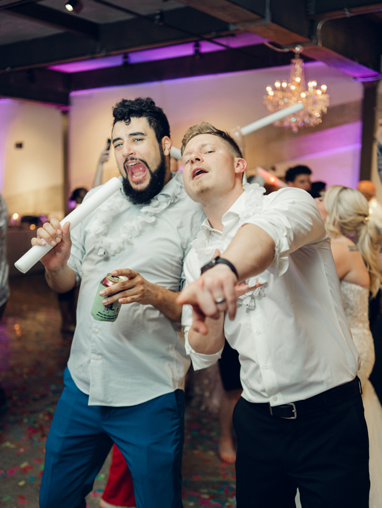 Guests dancing during Amanda and Corey's wedding day at The Bond Events.