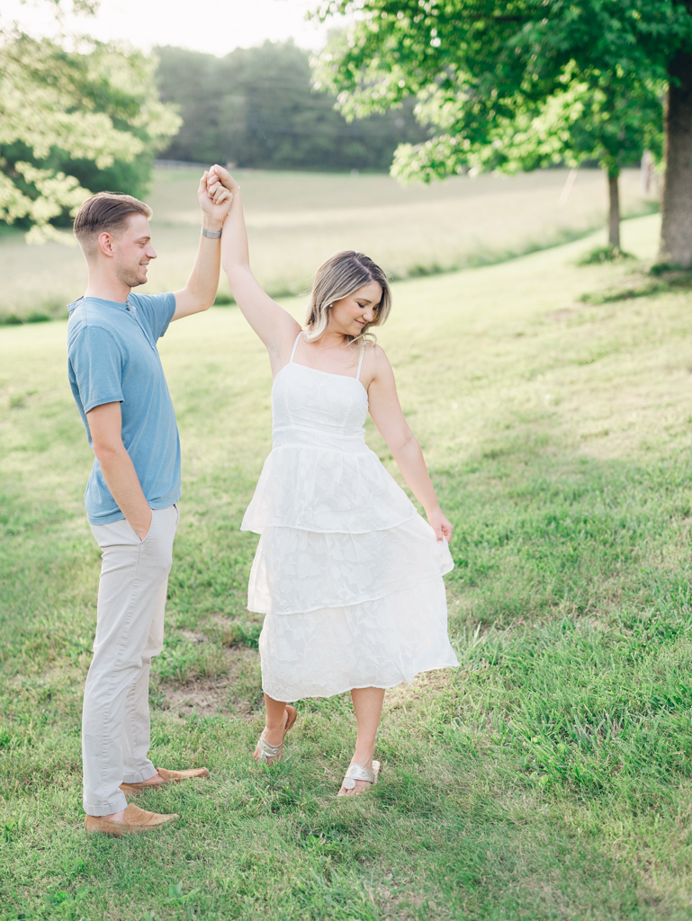 Victoria & Jacob together during golden hour for their engagement session at Cold Saturday Farm