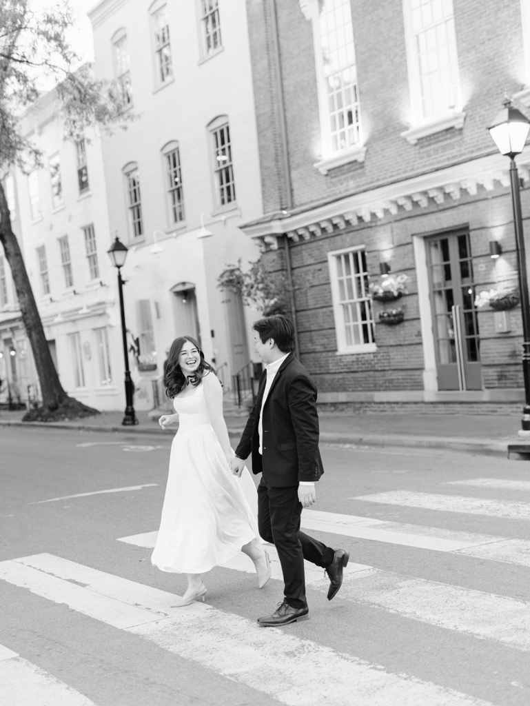 Chelsea & Wes crossing the street during their Old Town Alexandria engagement session