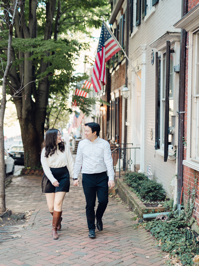 Chelsea and Wes walking along the historic streets of Old Town Alexandria