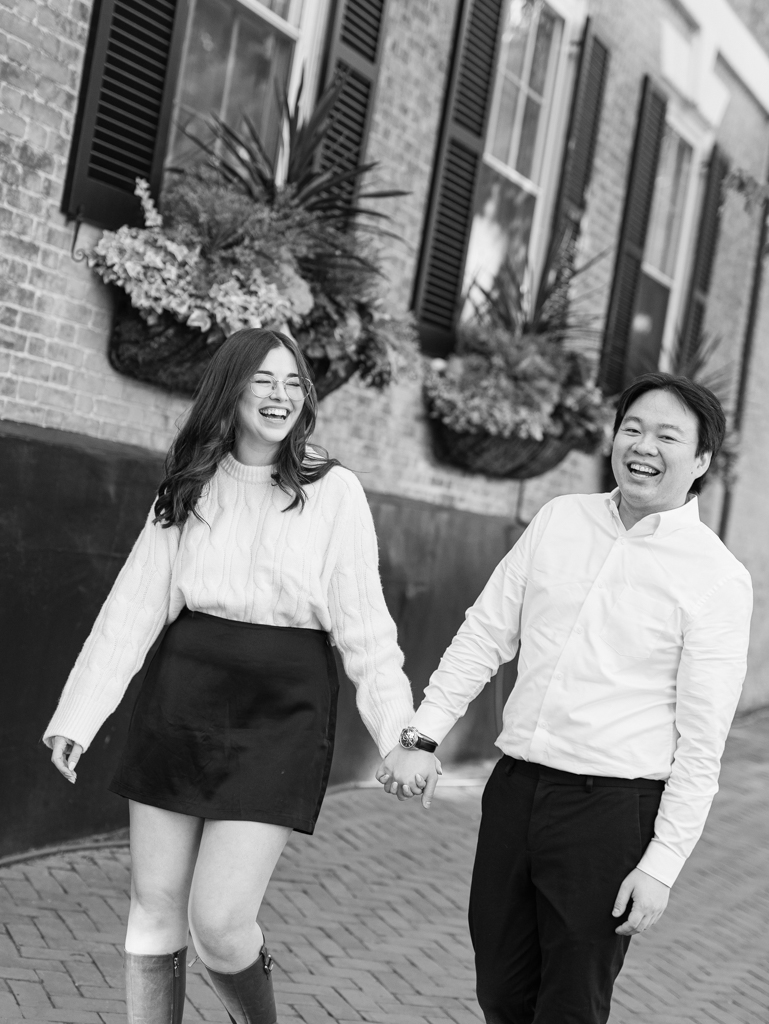 Chelsea and Wes walking along the historic streets of Old Town Alexandria