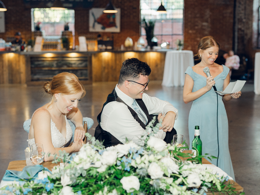 Toasts during Anna and Sam's McClintock Distilling Wedding in Frederick, Maryland