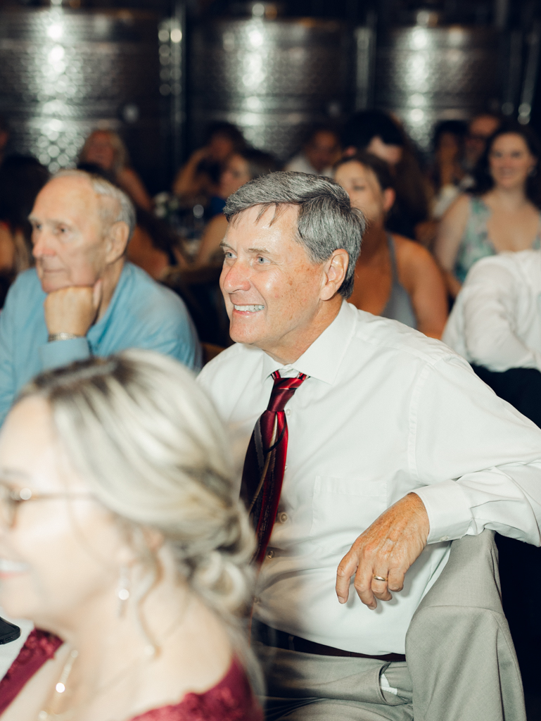 Toasts during Anna and Sam's McClintock Distilling Wedding in Frederick, Maryland