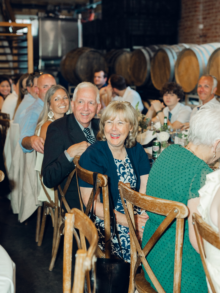 Toasts during Anna and Sam's McClintock Distilling Wedding in Frederick, Maryland