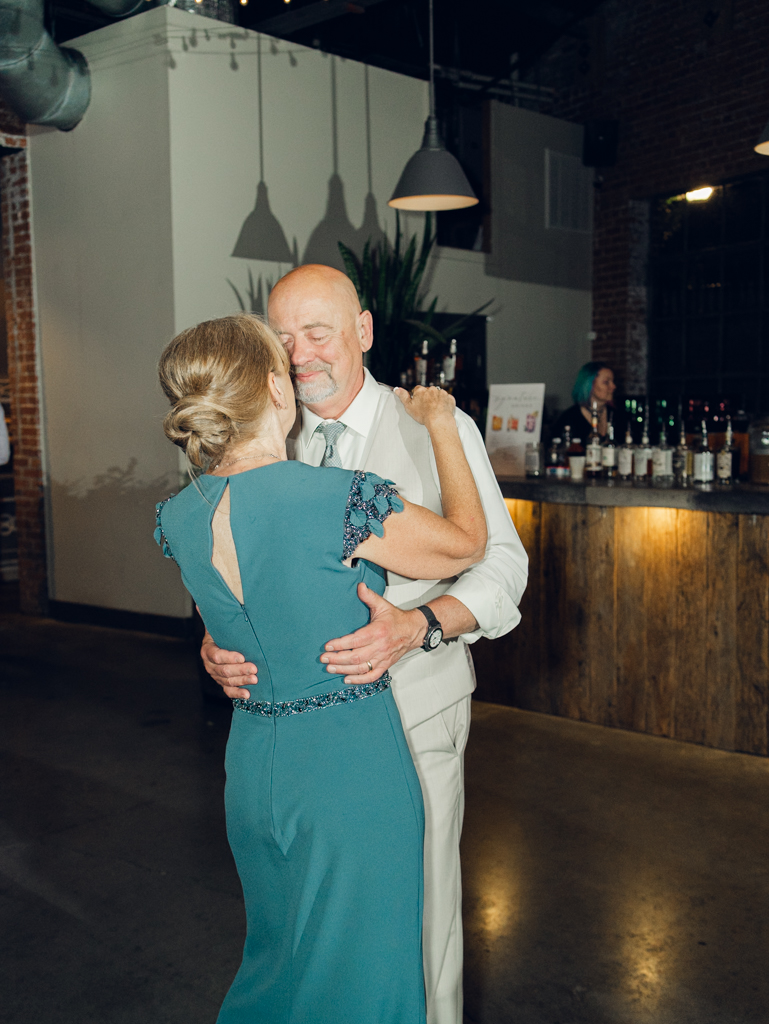 Dancing during Anna and Sam's McClintock Distilling Wedding in Frederick, Maryland