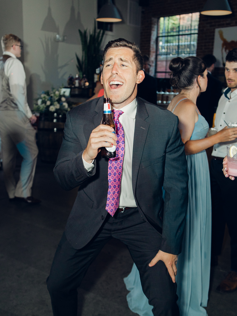 Dancing during Anna and Sam's McClintock Distilling Wedding in Frederick, Maryland