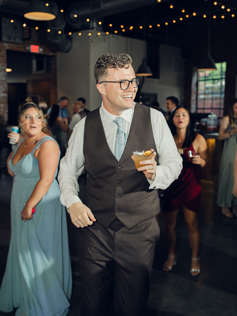 Dancing during Anna and Sam's McClintock Distilling Wedding in Frederick, Maryland