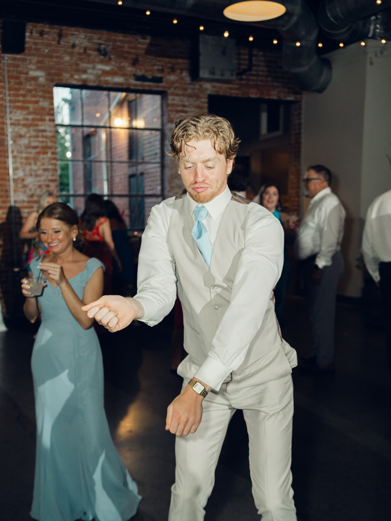 Dancing during Anna and Sam's McClintock Distilling Wedding in Frederick, Maryland