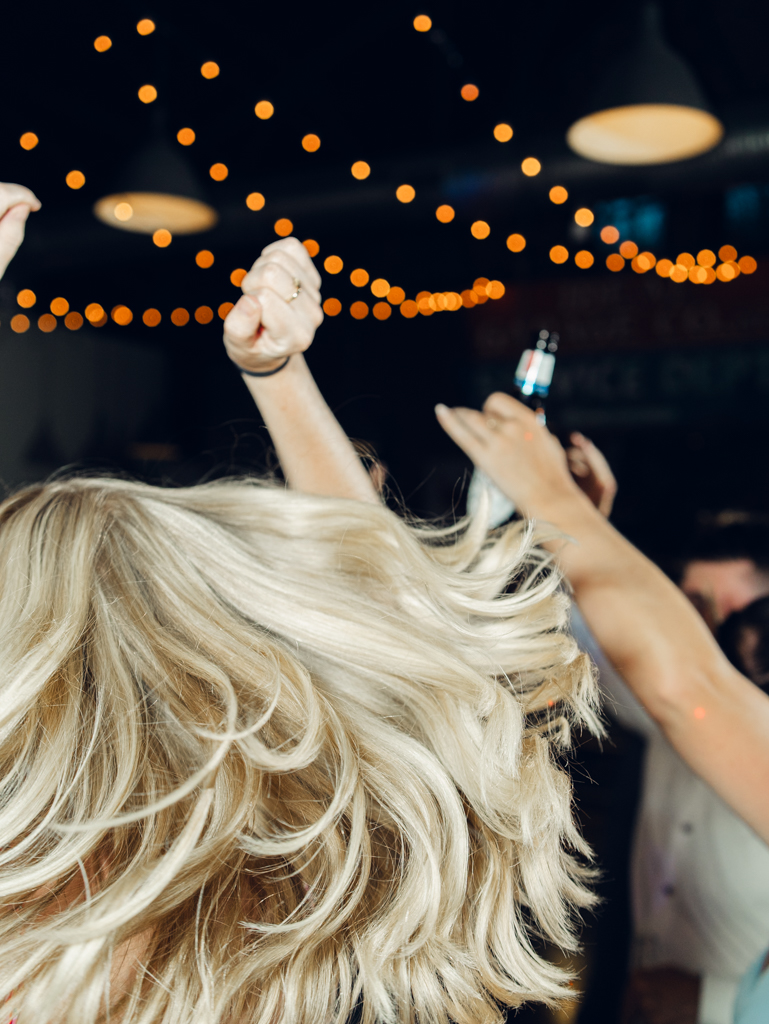 Dancing during Anna and Sam's McClintock Distilling Wedding in Frederick, Maryland