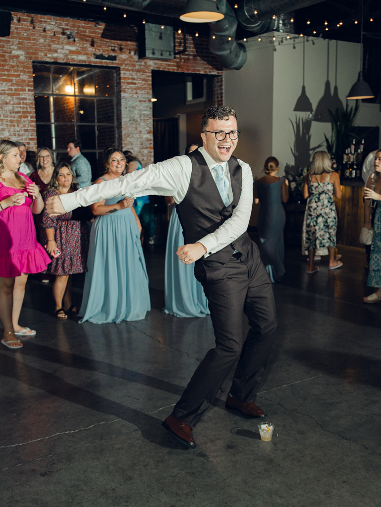 Dancing during Anna and Sam's McClintock Distilling Wedding in Frederick, Maryland