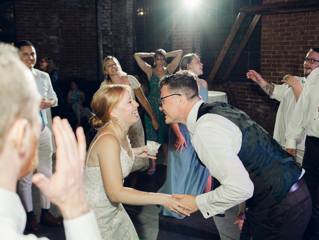 Dancing during Anna and Sam's McClintock Distilling Wedding in Frederick, Maryland