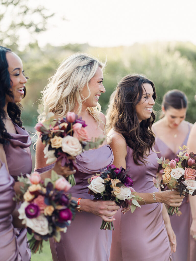 Wedding party laughing with each other