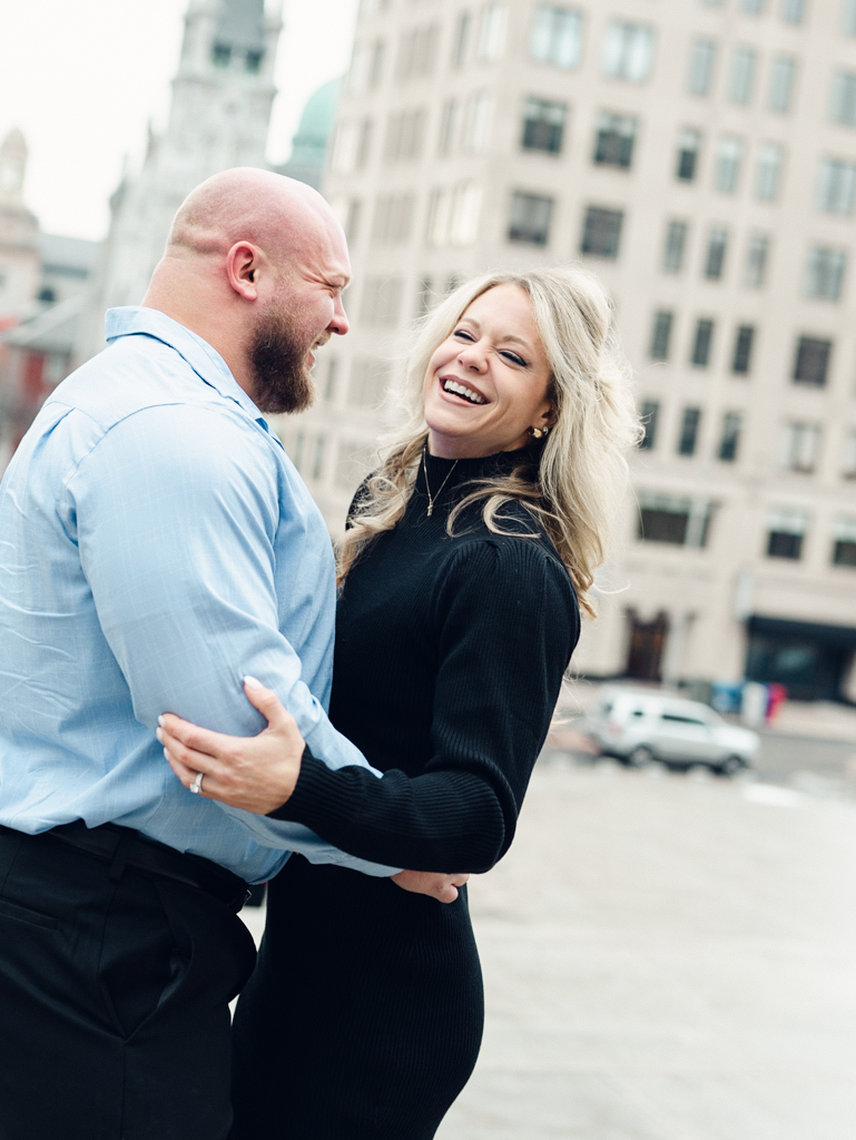 Elisa and Phil laughing at their Harrisburg Capitol Complex engagement session