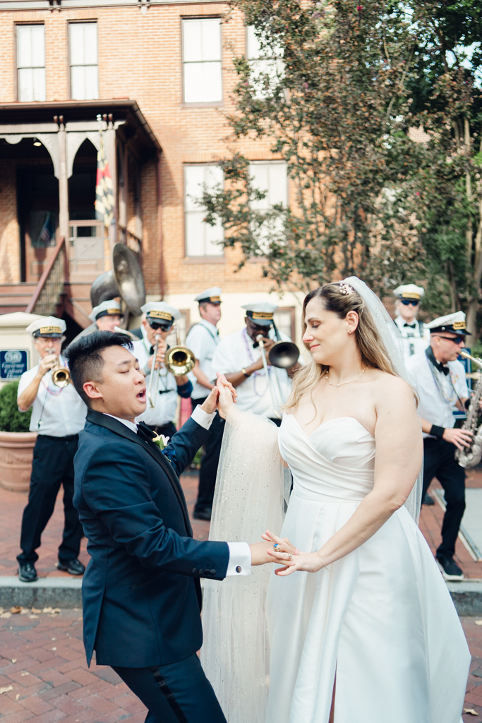 Tracie & Nick's Second Line on their Annapolis Wedding day outside of  Governor Calvert House, Historic Inns of Annapolis