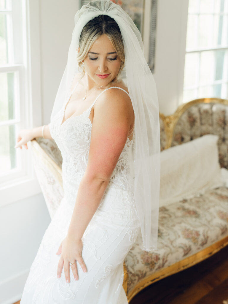 Bridal portrait at the Hummingbird Chateau, in her bridal gown and veil