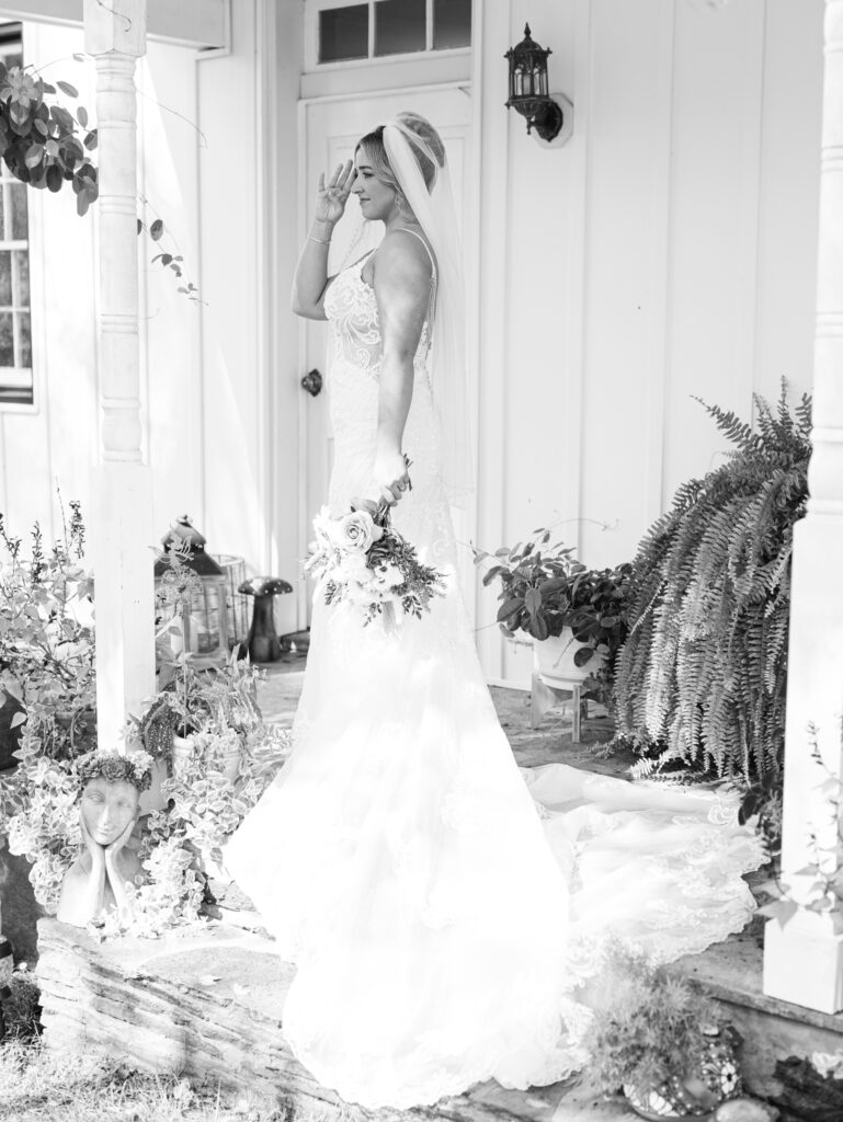 Amber's bridal portrait outside the manor house at The Hummingbird Chateau on her wedding day