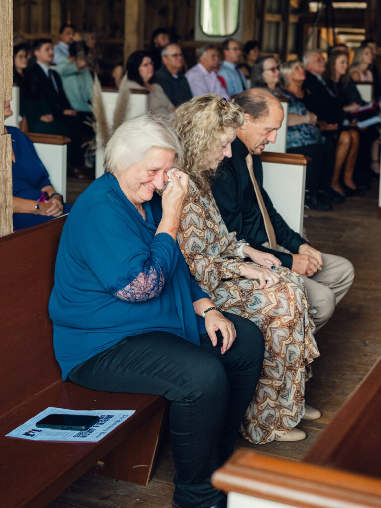 wedding guest getting emotional during a wedding ceremony