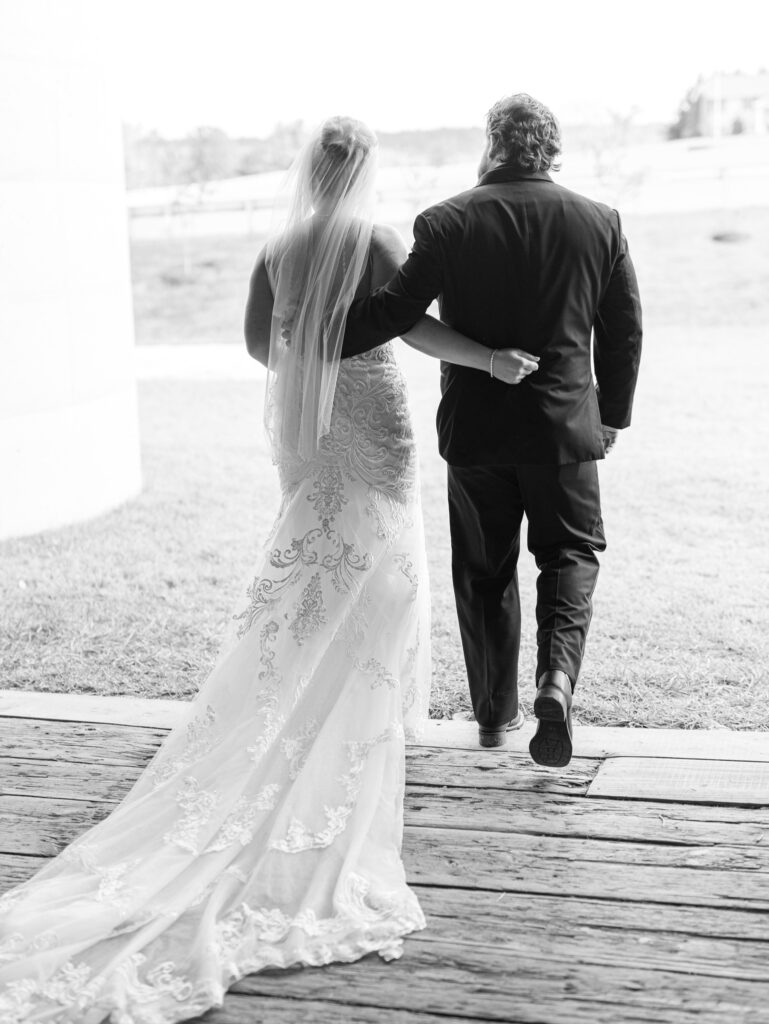 bride and groom walking out of their wedding ceremony at The Hummingbird Chateau