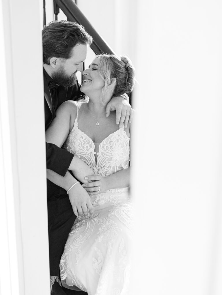 bride and groom enjoying a private moment inside the manor house at The Hummingbird Chateau on their wedding day. 