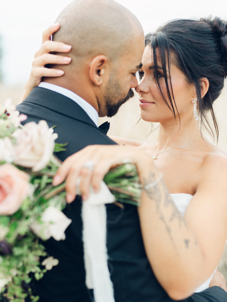 bride and groom sharing an intimate romantic moment on their wedding day