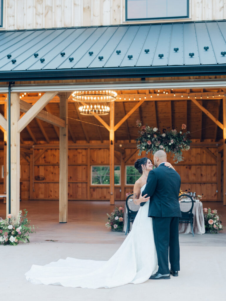 Bride and groom dancing at Bortner Valley a Hampstead, MD wedding venue by Sunset Florals, Events by Stace, Nicole Simensky Photography.