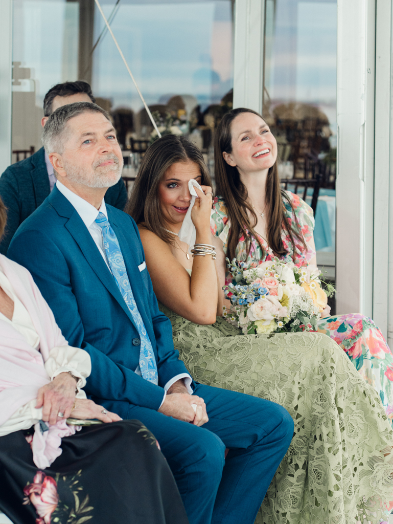 bride's family crying during wedding ceremony at Silver Swan Bayside