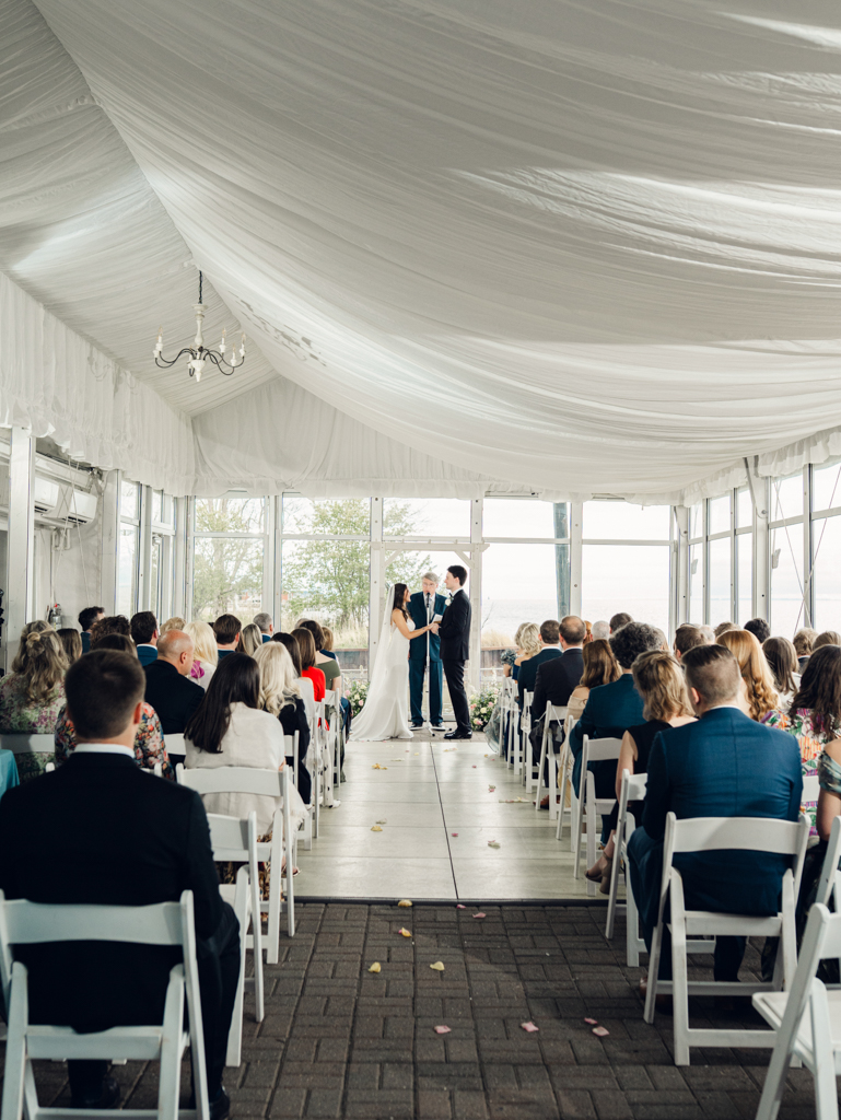 bride and groom at altar during wedding ceremony at Silver Swan Bayside