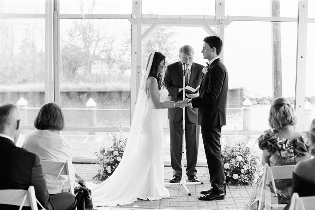 Bride and groom during their wedding ceremony taken by film wedding photographer
