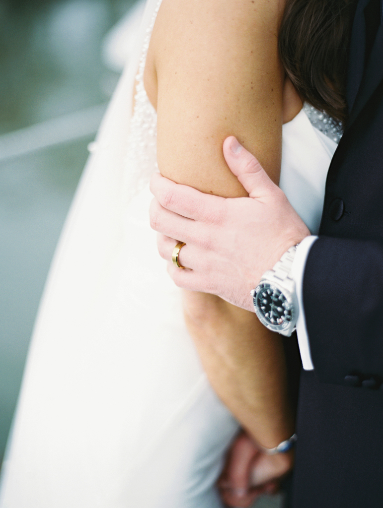 groom's wedding band and watch taken by film wedding photographer