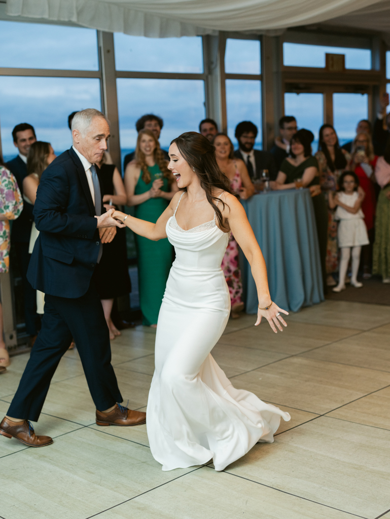 bride dancing with her dad on her wedding day