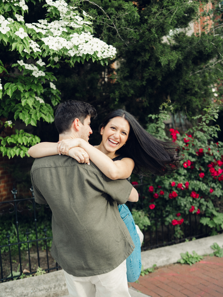 girl smiling during her engagement session at Logan Circle by dc film wedding photographer