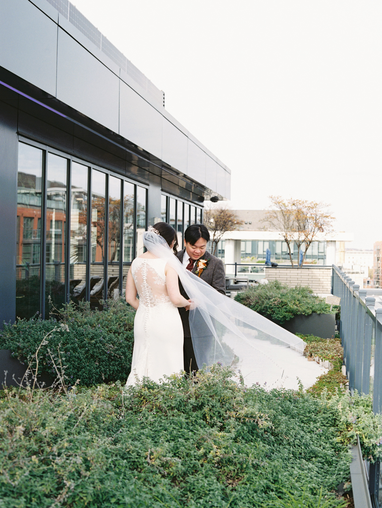 First look with bride and groom during their district winery wedding by dc wedding photographer Nicole Simensky photography